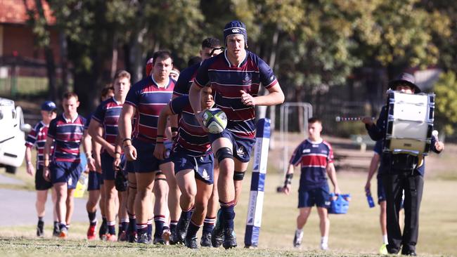 Michael van der Schyff of TSS leads out the team. Photograph : Jason O'Brien