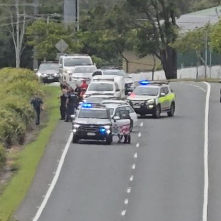 A man has been shot dead by police on the Gold Coast.