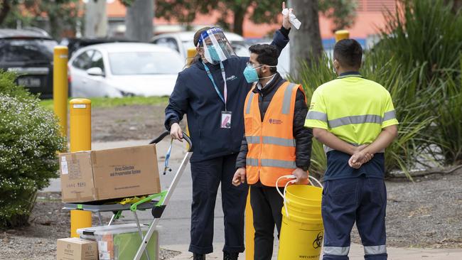 Health crews have been responding to the Covid scare at a Flemington public housing tower. Picture: Rob Leeson.