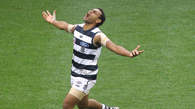 Travis Varcoe celebrates his gut-busting goal for Geelong in the 2011 Grand Final.