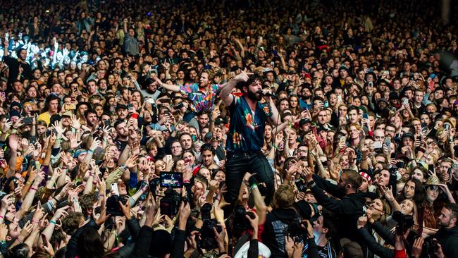 Foals front man Yannis Philippakis ventures out into the crowd during the band's set at Splendour in the Grass 2019. Supplied by SITG PR.