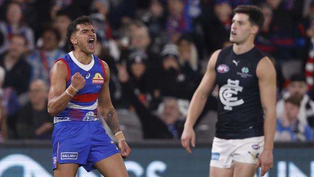 MELBOURNE, AUSTRALIA - JULY 13:  Jamarra Ugle-Hagan of the Bulldogs celebrates a goal during the round 18 AFL match between Western Bulldogs and Carlton Blues at Marvel Stadium, on July 13, 2024, in Melbourne, Australia. (Photo by Darrian Traynor/AFL Photos/via Getty Images)