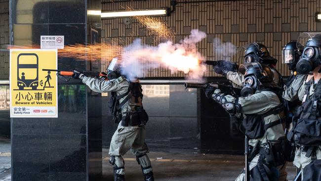 Riot police fire teargas and rubber bullets as protesters attempt to leave The Hong Kong Poytechnic University. Picture: Getty