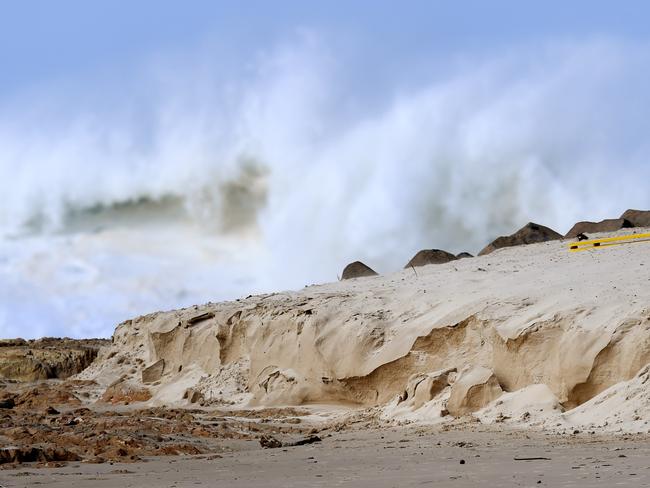 Surfers take advantage of large waves generated by cyclone Oma at Kirra beach on the Gold Coast, Sunday, February 24, 2019. Huge swells and high tides are pummelling south-east Queensland beaches as Cyclone Oma sits off the Queensland coast. (AAP Image/Dan Peled) NO ARCHIVING