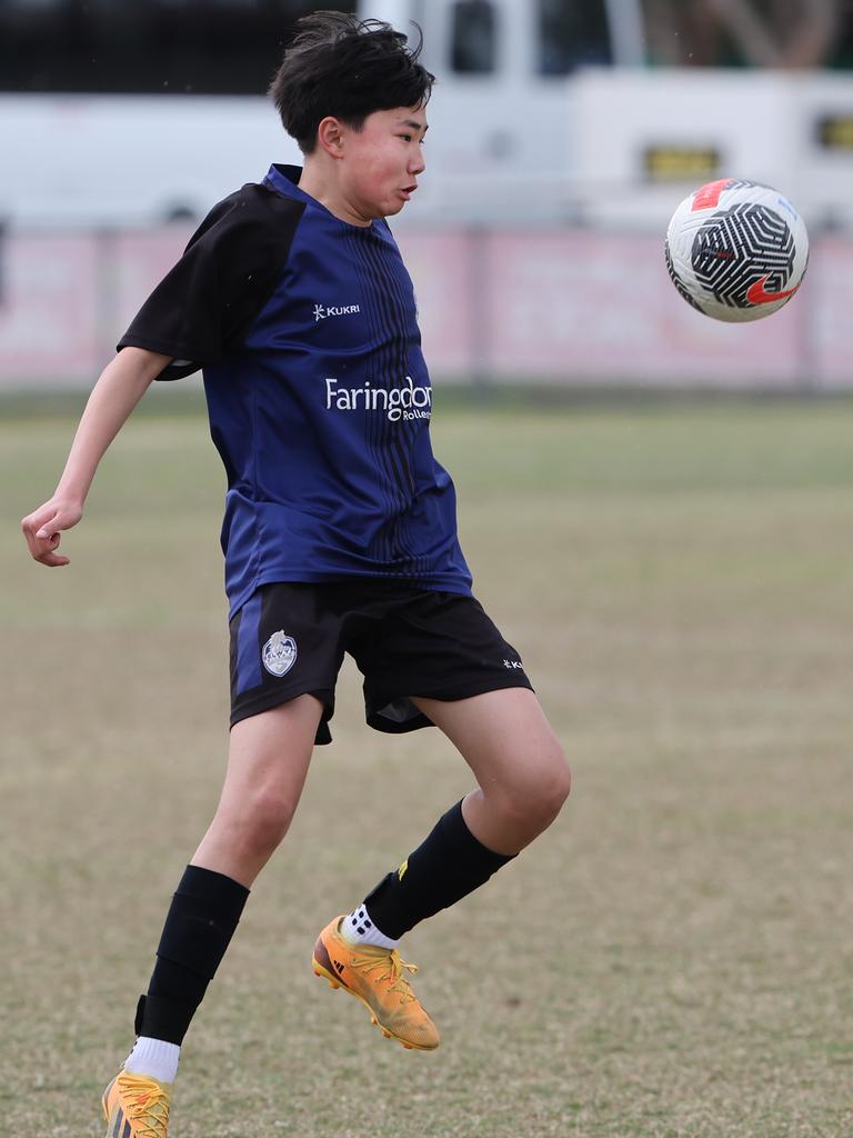 Premier Invitational Football 2024 tournament at Glennon Park Nerang. Field 1...Selwyn Utd (blue) V Brisbane Strikers (Yellow). Picture Glenn Hampson