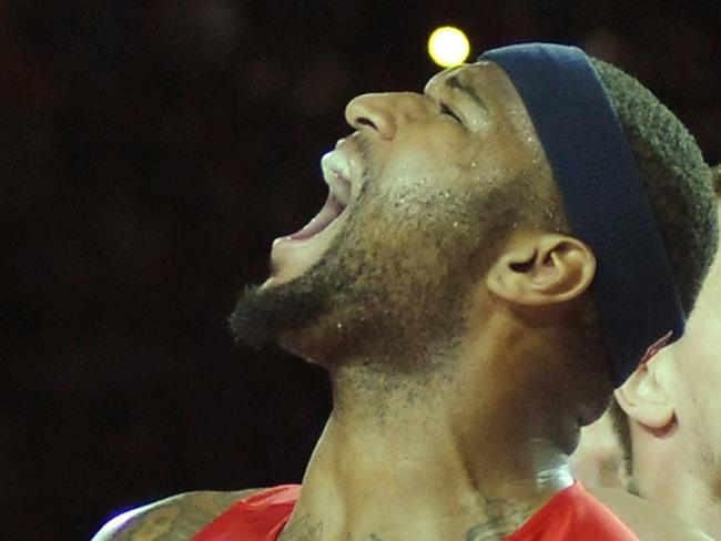US centre DeMarcus Cousins (L) reacts during the 2014 FIBA World basketball championships group C match Ukraine vs USA at the Bizkaia Arena in Bilbao on September 4, 2014. AFP PHOTO / ANDER GILLENEA