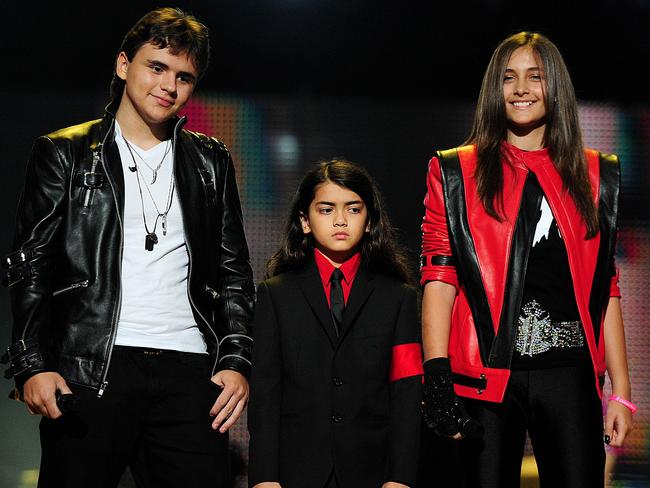 Michael Jackson's children, Prince Jackson, Blanket Jackson and Paris Jackson in 2011. Picture: AFP/Leon Neal