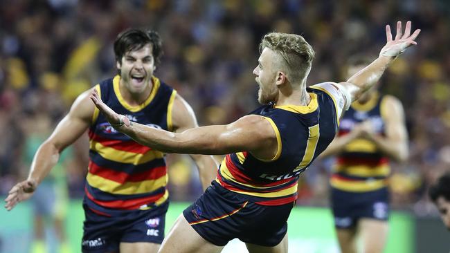 Hugh Greenwood snaps a goal against the Tigers. Picture: Sarah Reed