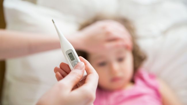 A fever is a common symptom. Image: iStock