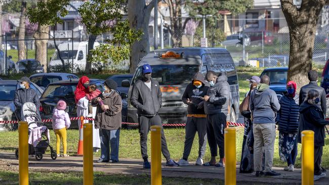 Residents of a Flemington public housing tower queue for Covid tests after their neighbours tested positive to the Delta strain. Picture: NCA NewsWire/David Geraghty