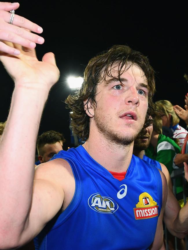 Picken high fives fans. Photo by Quinn Rooney/Getty Images