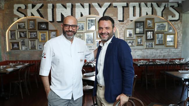 Chef Giuseppe Santoro and owner Pierre Moio (blue jacket) pictured in the restaurant, Skinny Tony’s. Picture Rohan Kelly