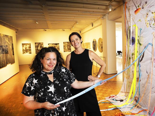 Emma Bett of the Bett Gallery and artist Nancy Mauro- Flude with a work titled cyberfeminist bedsheet transfigured by Nancy Mauro- Flude and Linda Dement. PICTURE CHRIS KIDD