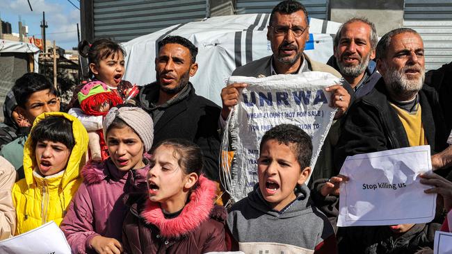 Palestinian men and children gather for a demonstration in Rafah in the southern Gaza Strip on January 30. Picture: AFP