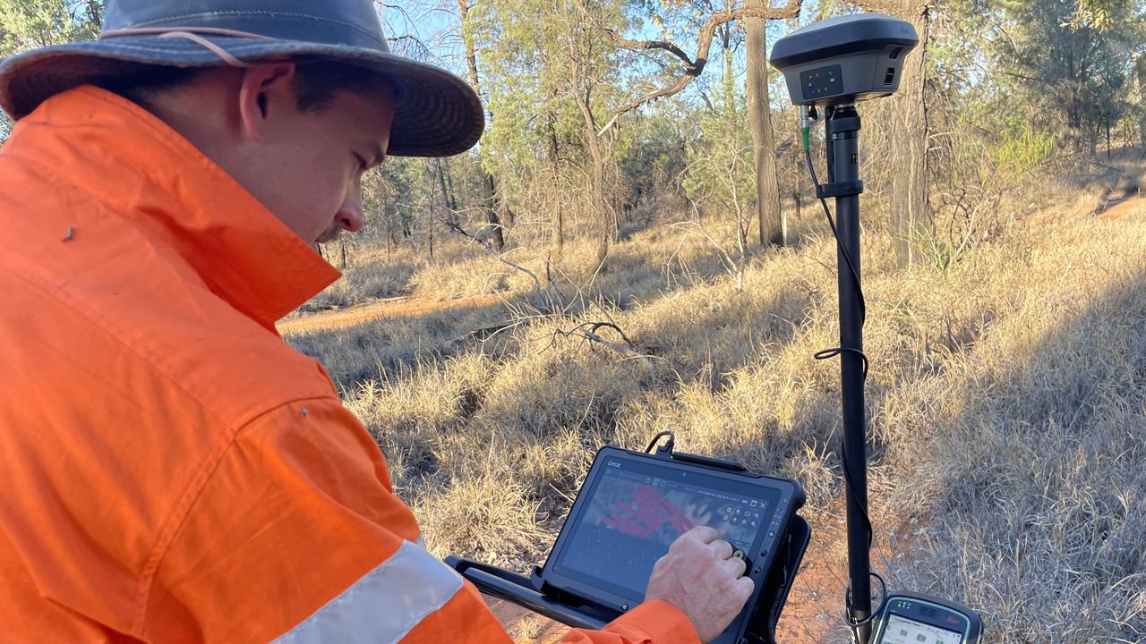 Max Thomas, GeoSpacial Technician at Subsurface Mapping Solutions, reviews initial outline of a Northern Hairy-nosed Wombat burrow system at Richard Underwood Nature Refuge. Picture: Australian Wildlife Conservancy.