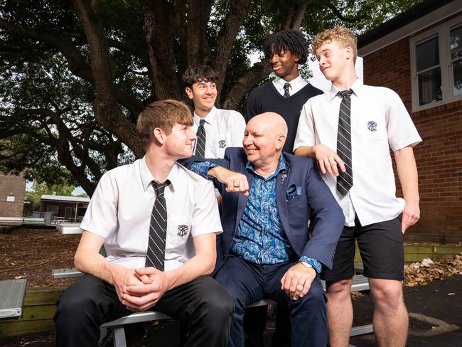 Ashfield school principal, Dwayne Hopwood with year 12 students Joe Dempsey-Martin, Isaiah Cham, Ali Abilba and Zac Argiratos.Photo: Tom Parrish