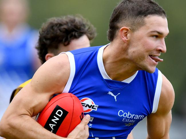 Sam Lowson of East Ringwood runs with the ball during the round eight EFNL Premier Eastland Senior Mens match between Rowville and East Ringwood at Seebeck Oval, on June 01, 2024, in Melbourne, Australia. (Photo by Josh Chadwick)