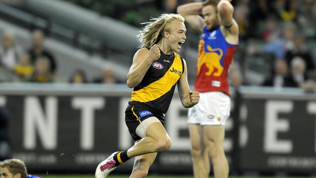 Ben Nason celebrating a goal for Richmond in 2011. Picture: AAP/Martin Philbey