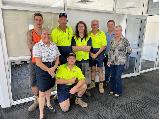 Townsville's COS staff members Myles, Julie, Carl, Regan, Rob, Joel, Maureen, and Steven are looking forward to a new chapter after previously being employed by Tosco. Picture: Supplied.