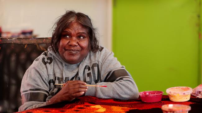 Aboriginal artist and 2017 Archibald prize finalist Tjungkara Ken at the Tjala Arts centre at Amata in the APY lands. Picture: Dylan Coker