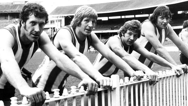 Corowa’s Peter Chisnall, second from right, with other North Melbourne players recruited from the Ovens and Murray, Phil Baker (Albury), Gary Cowton (Benalla) and Mick Nolan (Wangaratta Rovers). They are pictured at training at the MCG in 1974.