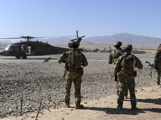 Photograph by: Corporal Raymond VanceCaption: Australian Special Operations Task Group Soldiers move towards waiting UH-60 Blackhawk helicopters as part of the Shah Wali Kot Offensive.Mid Caption: Shah Wali Kot Offensive Afghan National Security Forces (ANSF) partnered with Australian Special Forces from the Special Operations Task Group conducted a deliberate operation to clear a Taliban insurgent stronghold in the Shah Wali Kot region of northern Kandahar province.The Shah Wali Kot Offensive comprised synchronised and deliberate clearance operations involving Australian Commandos combined with a number of surgical helicopter-born assaults from Special Air Service (SAS) troops on key targets.Removing Taliban insurgents from Afghan communities allows the Government of Afghanistan to establish a presence and gain the trust of the community to provide them with necessary infrastructure and security that was not provided by the insurgents.The Shah Wali Kot Offensive was part of Australia   s contribution to Operation Hamkari, the Coalition operation to extend the Government of Afghanistan   s influence into Kandahar City.