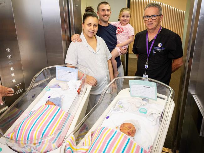 Dr Stephen Cole with the Stephens family in a hospital lift. Picture: Mark Stewart
