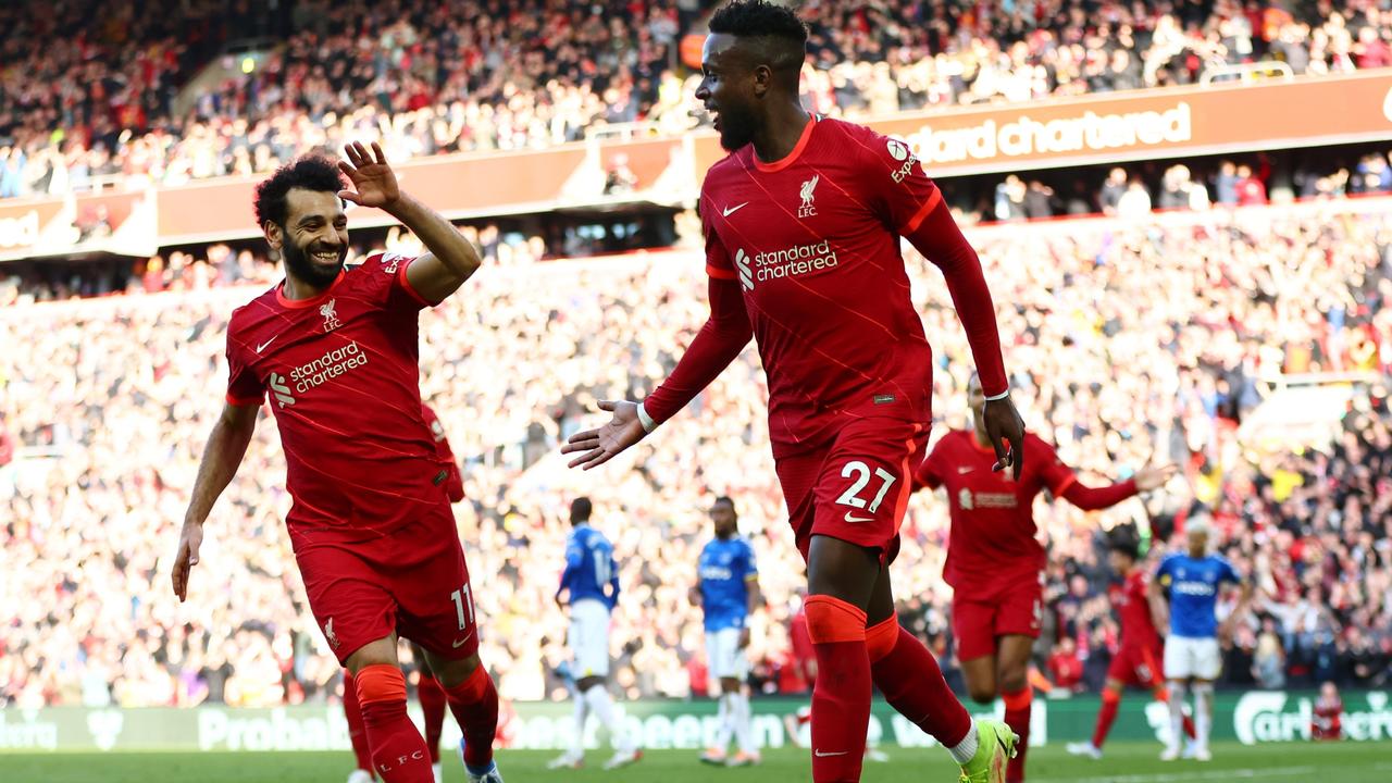 LIVERPOOL, ENGLAND - APRIL 24: Divock Origi celebrates eith Mohamed Salah of Liverpool after scoring their team's second goal during the Premier League match between Liverpool and Everton at Anfield on April 24, 2022 in Liverpool, England. (Photo by Clive Brunskill/Getty Images)