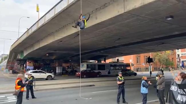 Extinction Rebellion protesters near the Morphett Street Bridge. Picture: Facebook