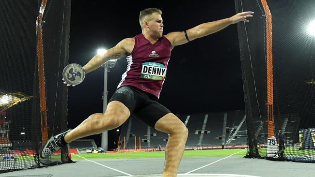 Matthew Denny on his way to winning the discus final at the Australian Athletics Championships.