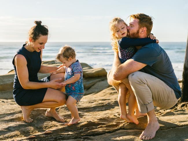 Dr Matt Dun with his daughter Josephine, 3, who was diagnosed with brain cancer and his wife Dr Phoebe Dun and son George. Picture: littlekitephotography.com.au