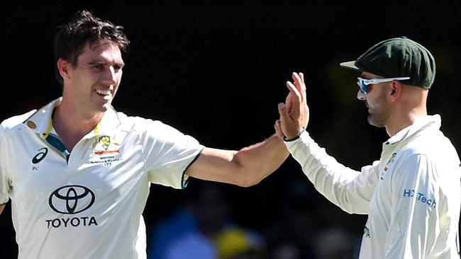 Pat Cummins celebrates after taking the wicket of Kirk McKenzie. (Photo by Bradley Kanaris/Getty Images)