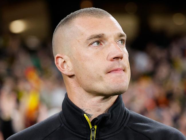 MELBOURNE, AUSTRALIA - AUGUST 24: Retiree Dustin Martin of the Tigers looks on whilst participating in a lap of honour during the 2024 AFL Round 24 match between the Richmond Tigers and the Gold Coast SUNS at The Melbourne Cricket Ground on August 24, 2024 in Melbourne, Australia. (Photo by Dylan Burns/AFL Photos via Getty Images)