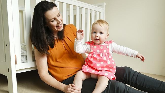 Alice Telford, with Florence 10 months, is one of many women who are giving up fulltime careers to be stay-at-home mums. Picture: Justin Lloyd.