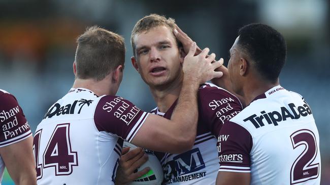 Tom Trbojevic celebrates scoring a try for Manly earlier this season.