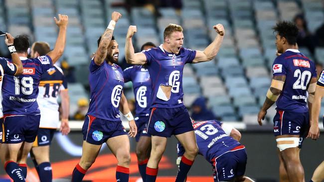 CANBERRA, AUSTRALIA - MAY 12:  Reece Hodge of the Rebels celebrates with team mates after winning the round 12 Super Rugby match between the Brumbies and the Rebels at GIO Stadium on May 12, 2018 in Canberra, Australia.  (Photo by Mark Nolan/Getty Images)