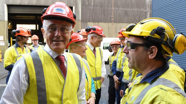 Mr Turnbull meets steel workers during a visit to BlueScope Steel in Wollongong. Picture: AAP