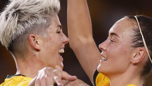 MELBOURNE, AUSTRALIA - FEBRUARY 28: Michelle Heyman of the Matildas celebrates a goal with team mare Caitlin Foord during the AFC Women's Olympic Football Tournament Paris 2024 Asian Qualifier Round 3 match between Australia Matildas and Uzbekistan at Marvel Stadium on February 28, 2024 in Melbourne, Australia. (Photo by Darrian Traynor/Getty Images) *** BESTPIX ***