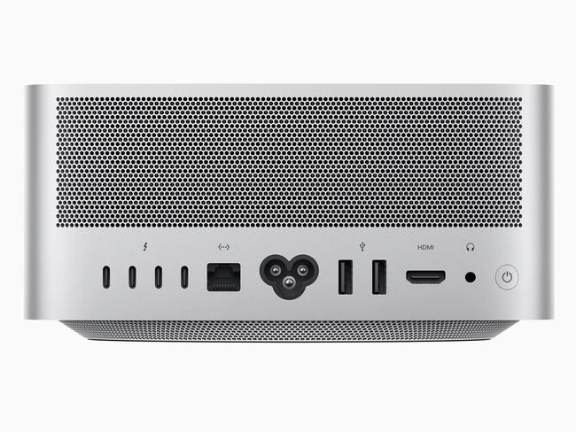 The back of the Apple Mac Studio with its array of ports and ventilation perforations.