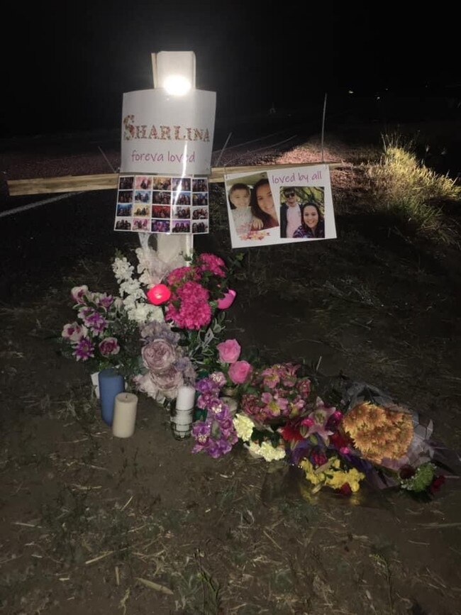 Mourners have converged on the crash site to lay flowers, leave messages and light candles.