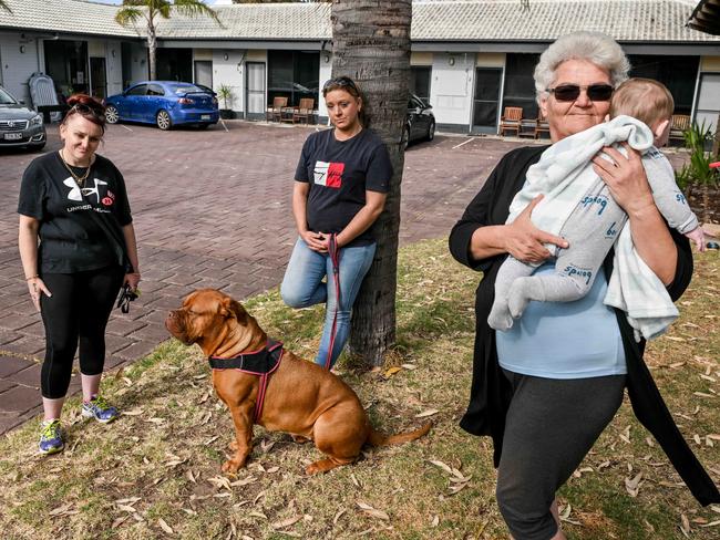 OCTOBER 23, 2024: Angie, Cass Richardson with her dog Armani and Rose Brahimi with her grandson she is raising are staying in the emergency accommodation at Port Noarlunga Motel. Picture: Brenton Edwards