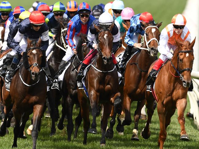 Craig Williams and Vow And Declare lead the field out of the home straight on the first occasion. Picture: Getty Images