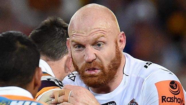 Keith Galloway of the Wests Tigers (right) in action during their round 19 NRL match against the Brisbane Broncos at Suncorp Stadium in Brisbane, Sunday, July 19, 2015. (AAP Image/Dan Peled) NO ARCHIVING, EDITORIAL USE ONLY