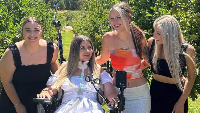 Ulverstone woman Janette 'Jannie' MacLeod, who lives as a C2 quadriplegic following an accident at Gawler in May 2020, with friends Paige Court, Mikayla Moore, and Zoe Bonney. Picture: Supplied