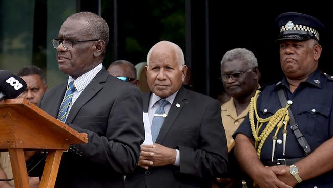 Jeremiah Manele outside Parliament House after being elected Prime Minister on Thursday, with former leader Manasseh Sogavare at rear in yellow. Picture: AFP