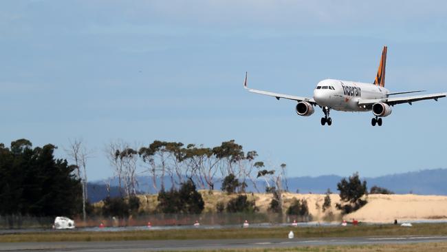 The first Tigerair plane direct from Gold Coast to Hobart comes into land at Hobart Airport.