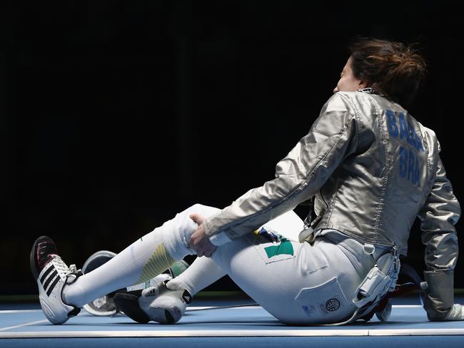 Marta Baeza Centurion of Brazil goes down injured during competition against Bogna Jozwiak of Poland