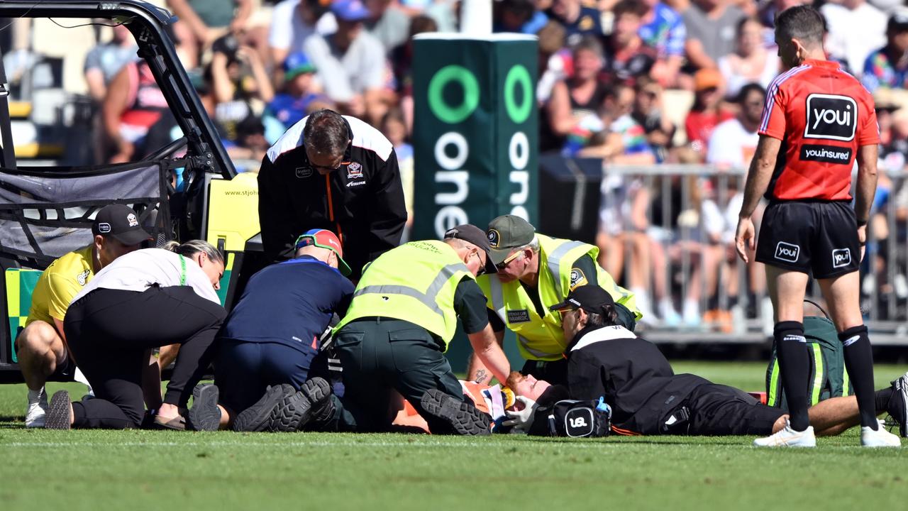 Declan Casey was helped from the field after he was hit high. Picture: Kai Schwoerer/Getty Images