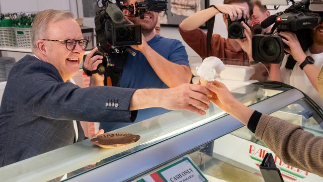 SYDNEY, AUSTRALIA - NewsWire Photos - Sunday, 4 May 2025:Prime Minister Anthony Albanese pictured serving Ice cream at Bar Italia, Norton Street, Leichhardt after having coffee with supporters.Picture: NewsWire / Monique Harmer