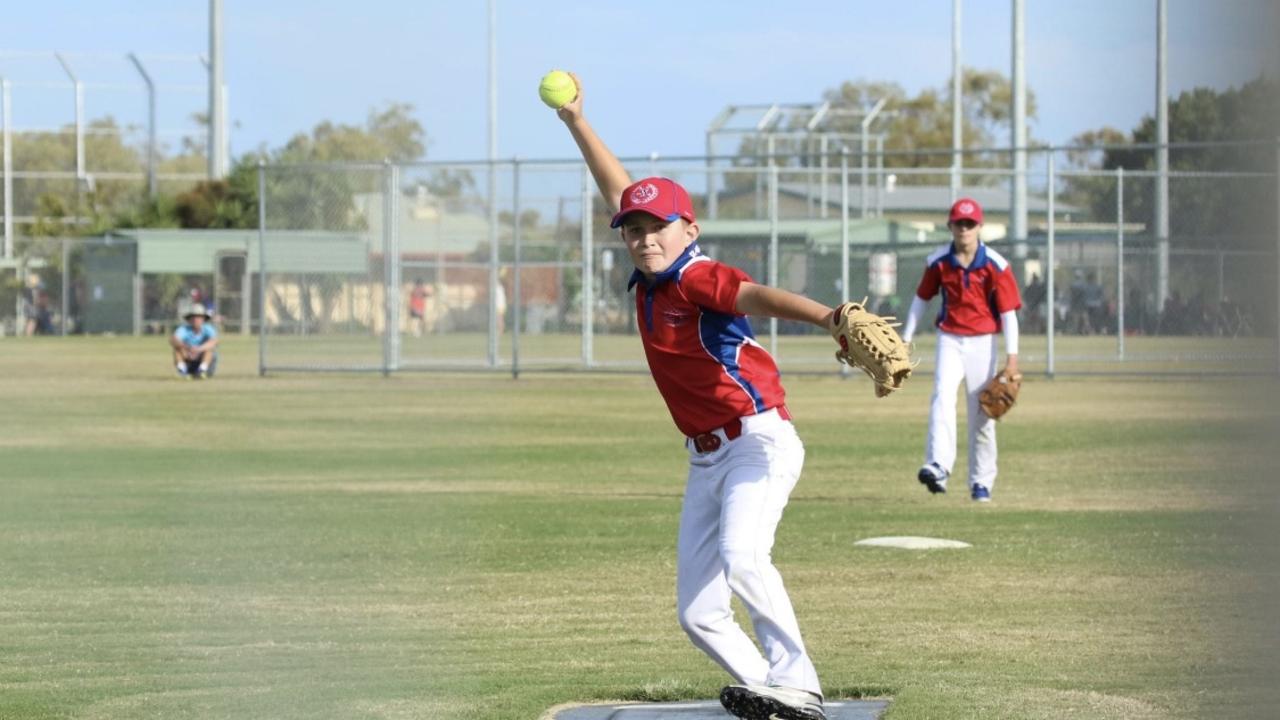 Flynn Edards in action for the Darling Downs U12 softball team.